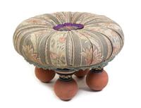 A Mackenzie Childs Ottoman Diameter 21 inches. — LATE 20TH CENTURY