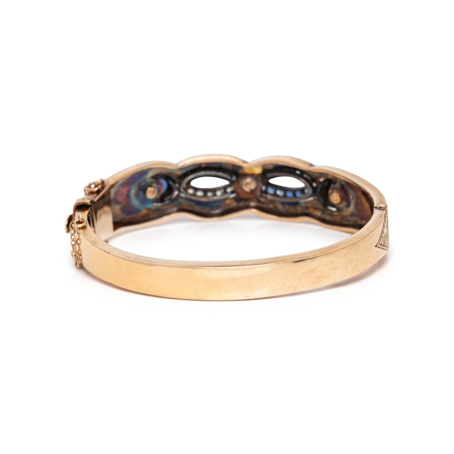 SAPPHIRE, DIAMOND, AND YELLOW GOLD BANGLE BRACELET