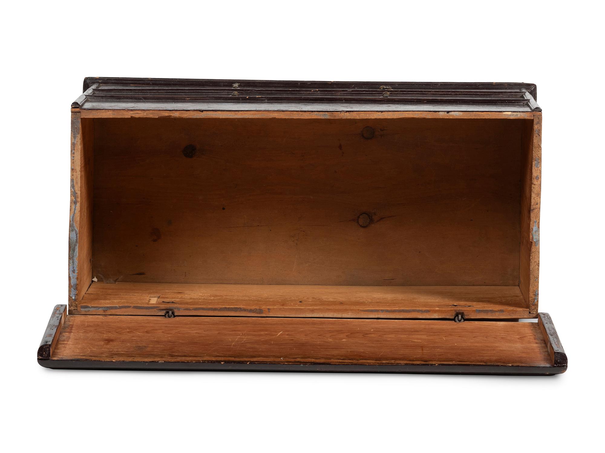 A Rare Pilgrim Century Black Painted Pine One-Drawer 'M' Chest