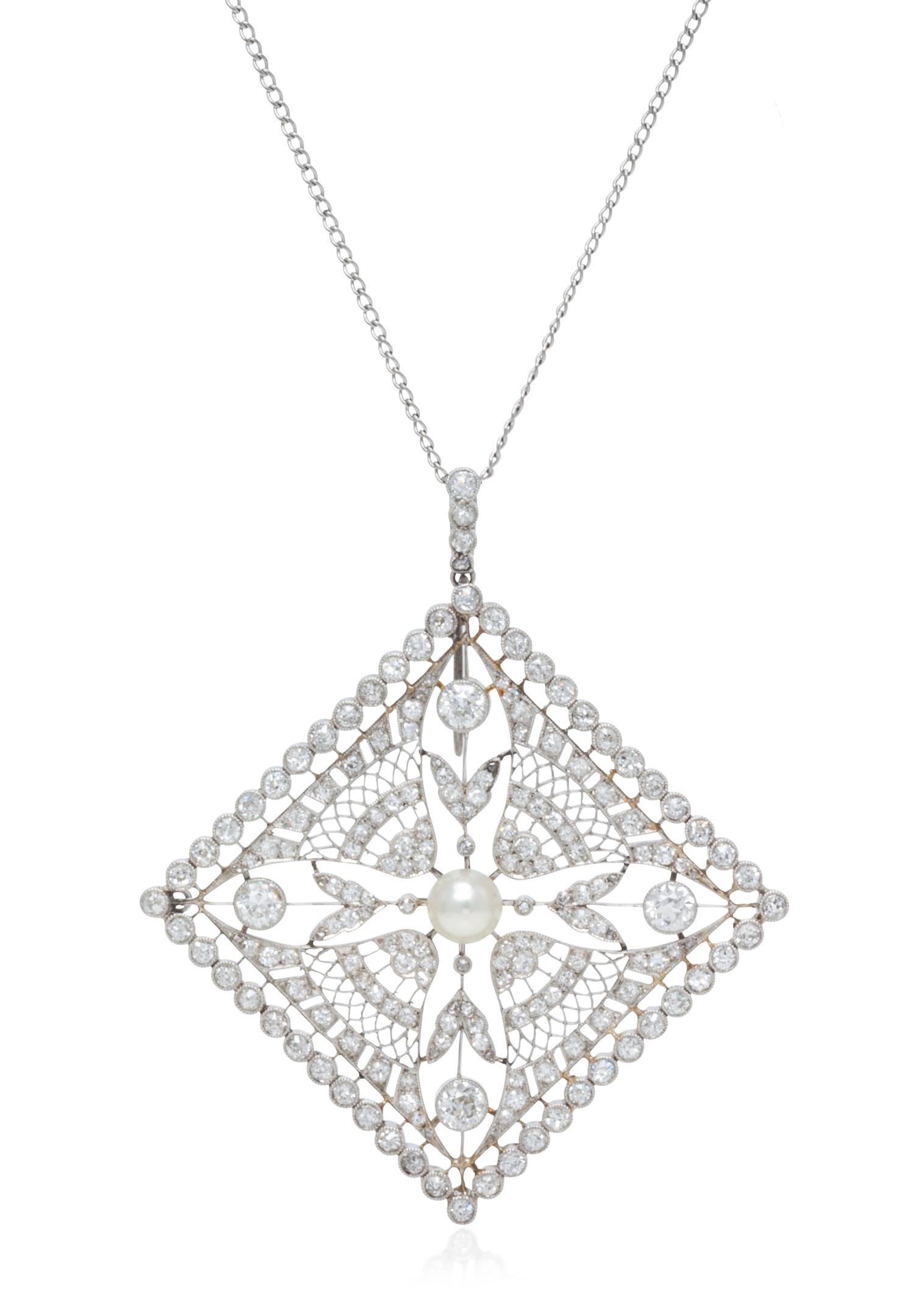 An Edwardian Platinum, Natural Pearl and Diamond Pendant, 10.00 dwts.
