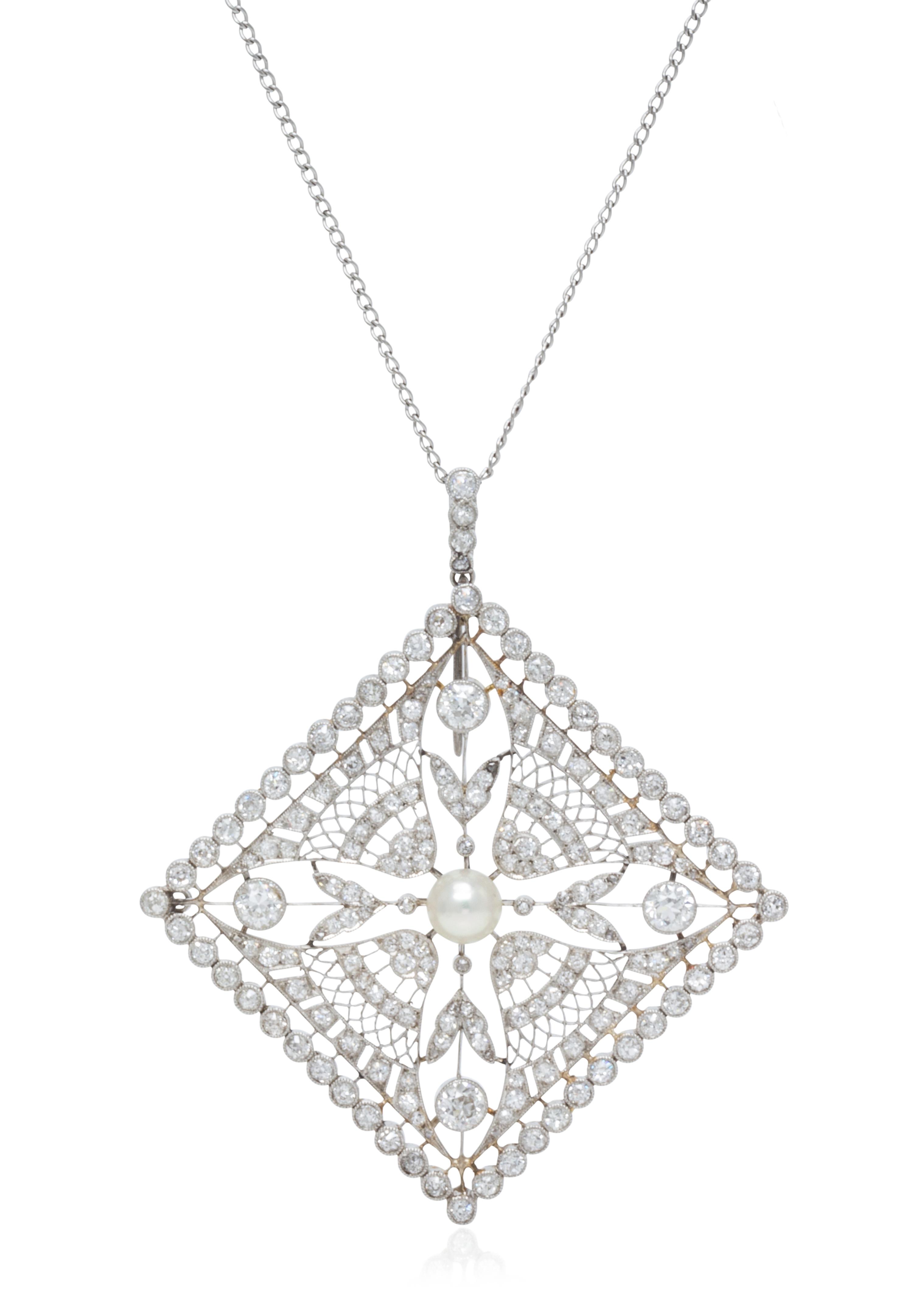 An Edwardian Platinum, Natural Pearl and Diamond Pendant, 10.00 dwts.