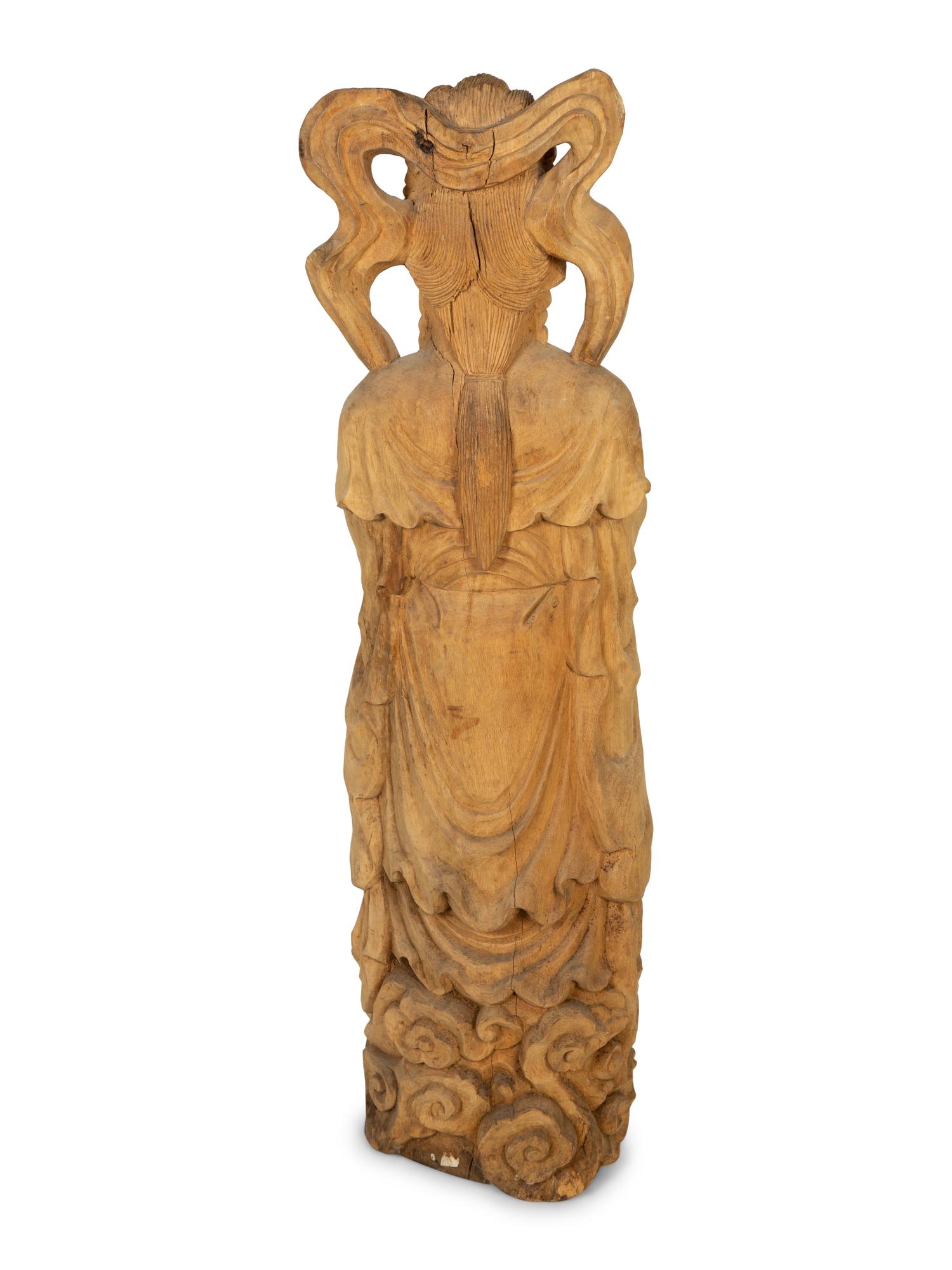 A Carved Wood Figure of Guanyin