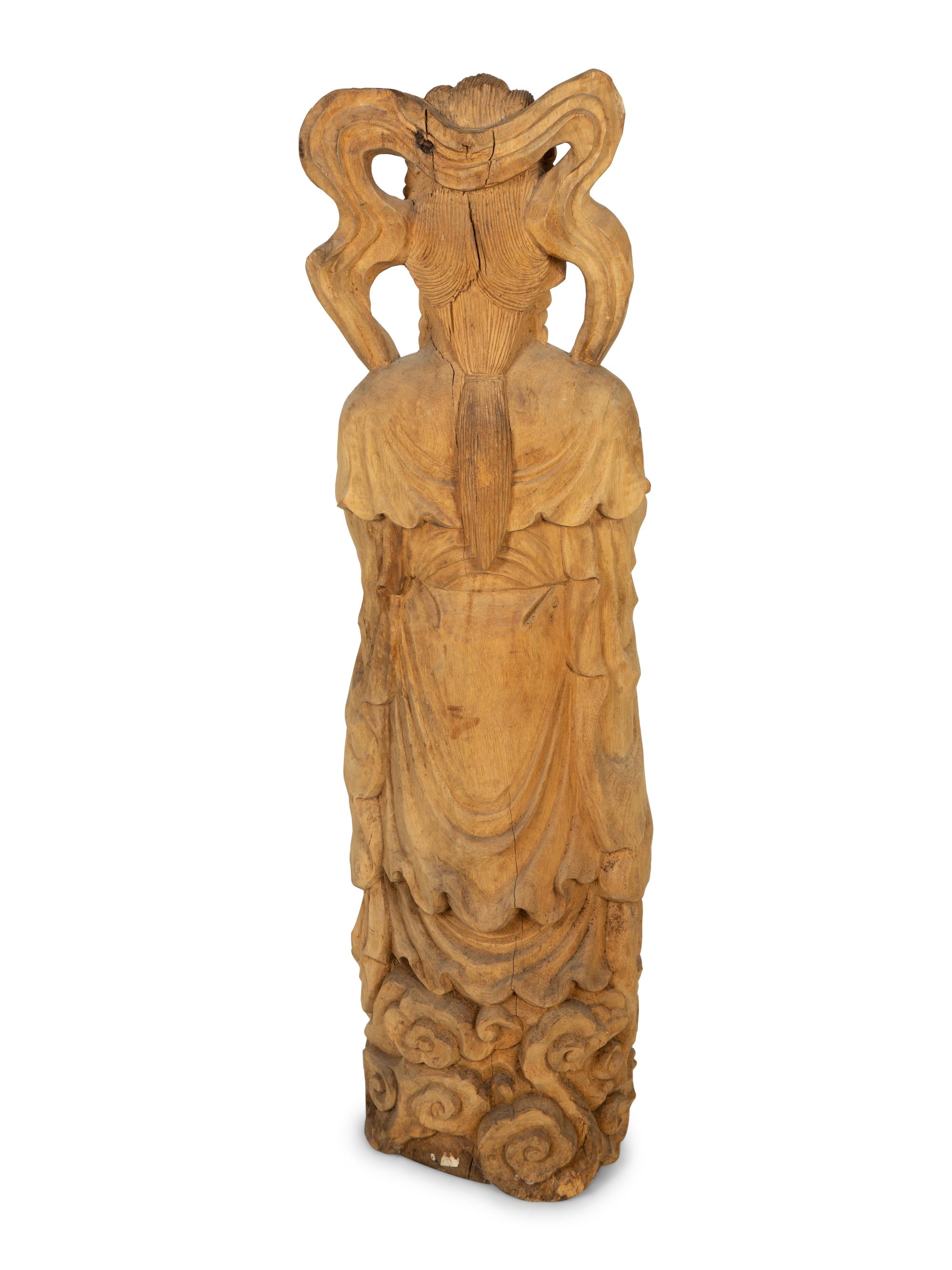 A Carved Wood Figure of Guanyin