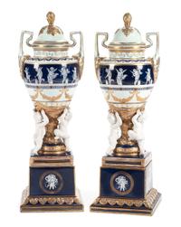 A Pair of Minton Style Porcelain and Bisque Covered Urns Height 28 1/2 inches.