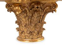 A Regency Style Brass Mounted Black Granite and Giltwood Center Table