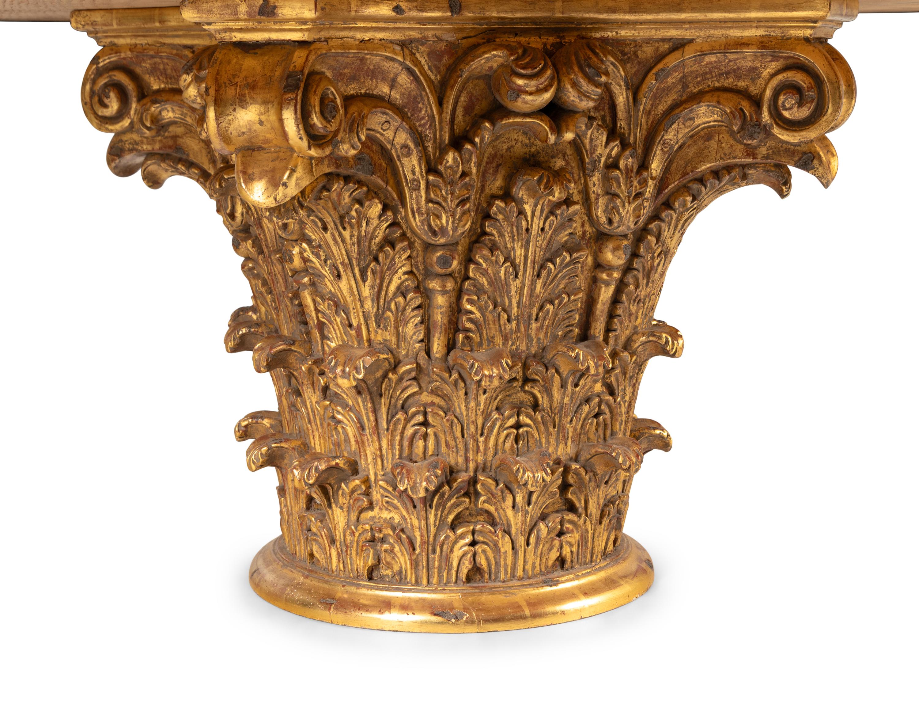 A Regency Style Brass Mounted Black Granite and Giltwood Center Table