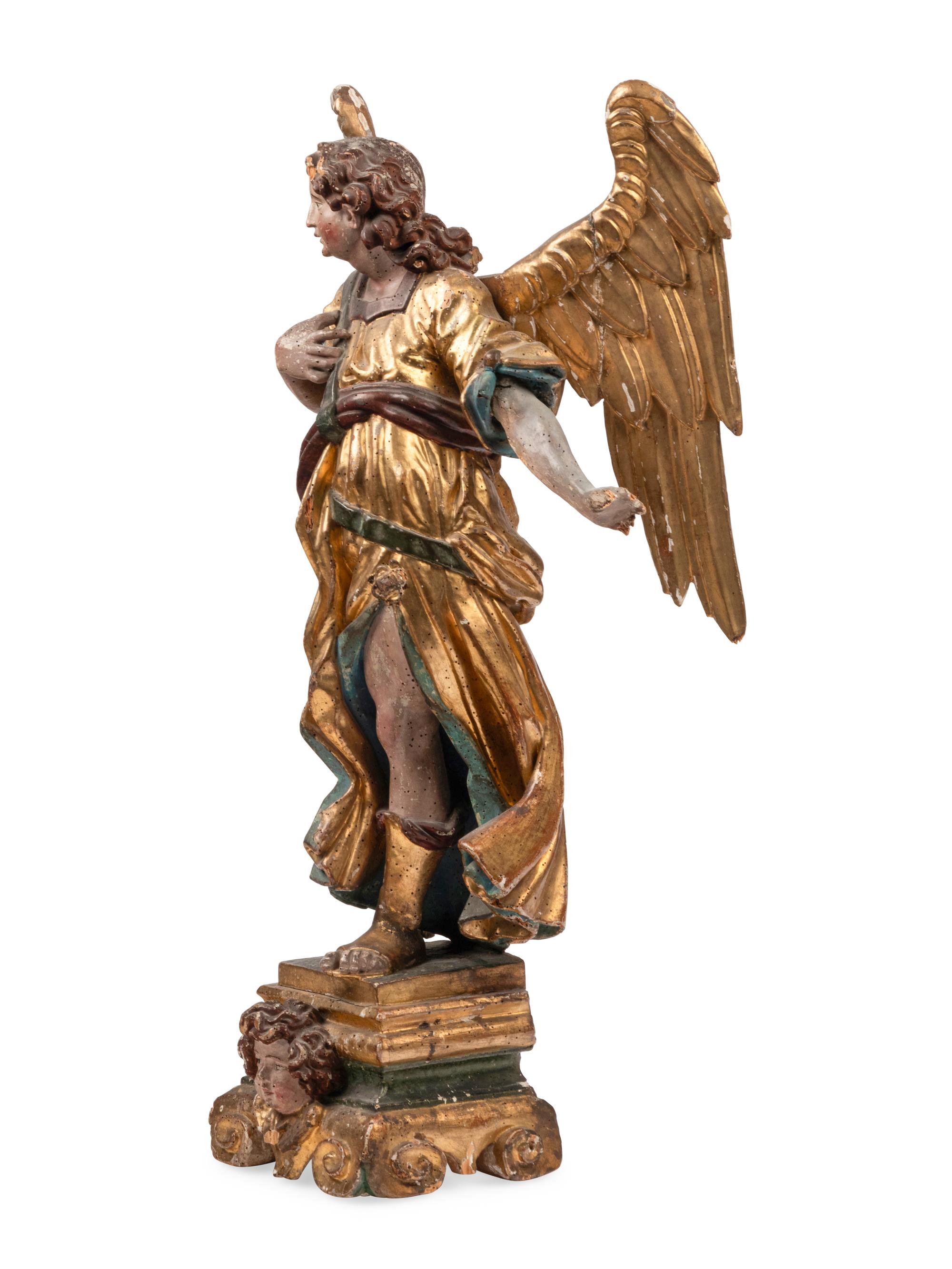 An Italian Polychrome Painted and Parcel-Gilt Angel Figure
