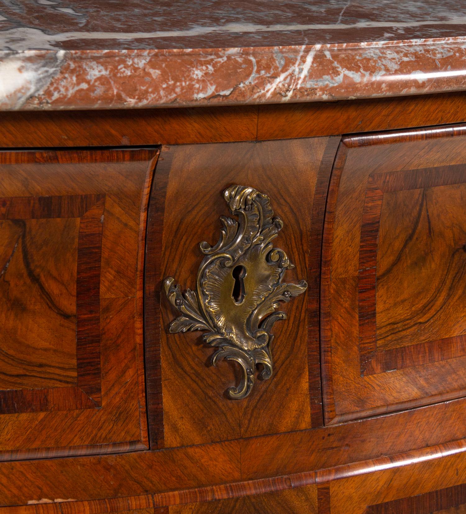 A Régence Style Rosewood-Banded Walnut Marble-Top Commode