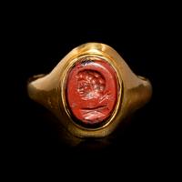 A Roman Gold and Red Jasper Finger Ring Engraved with the Bust of a Man