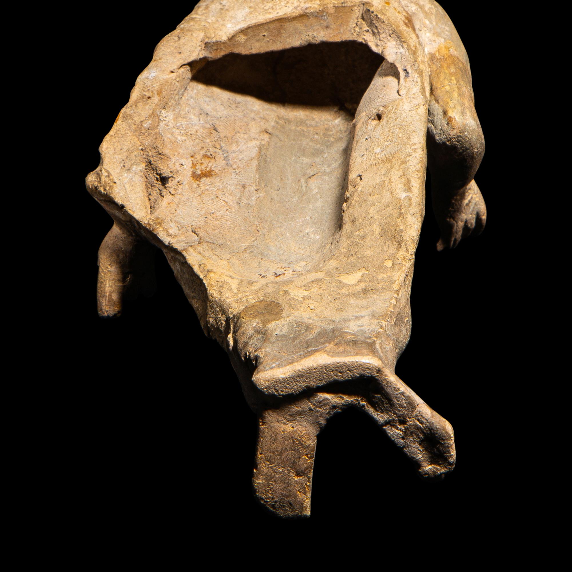 A Roman Terracotta Figure of a Youth