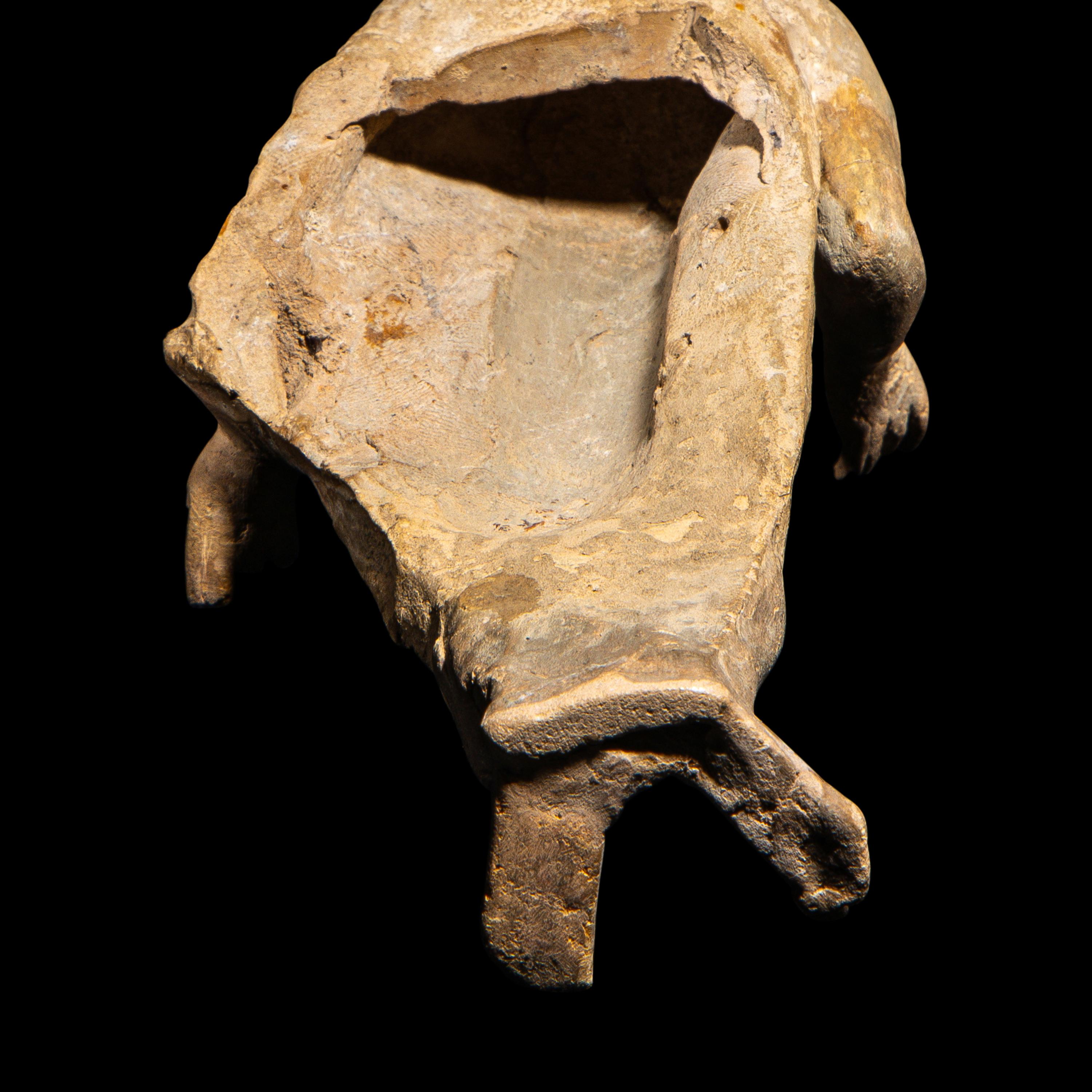 A Roman Terracotta Figure of a Youth