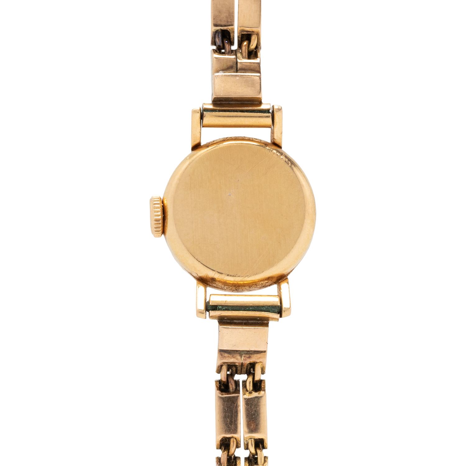 HAUSMANN, 18K YELLOW GOLD WATCH