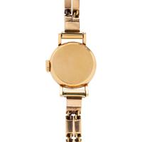 HAUSMANN, 18K YELLOW GOLD WATCH