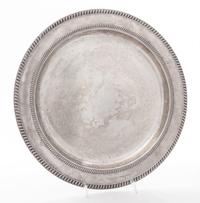 A Silver Charger. Diameter 13 1/2 inches.