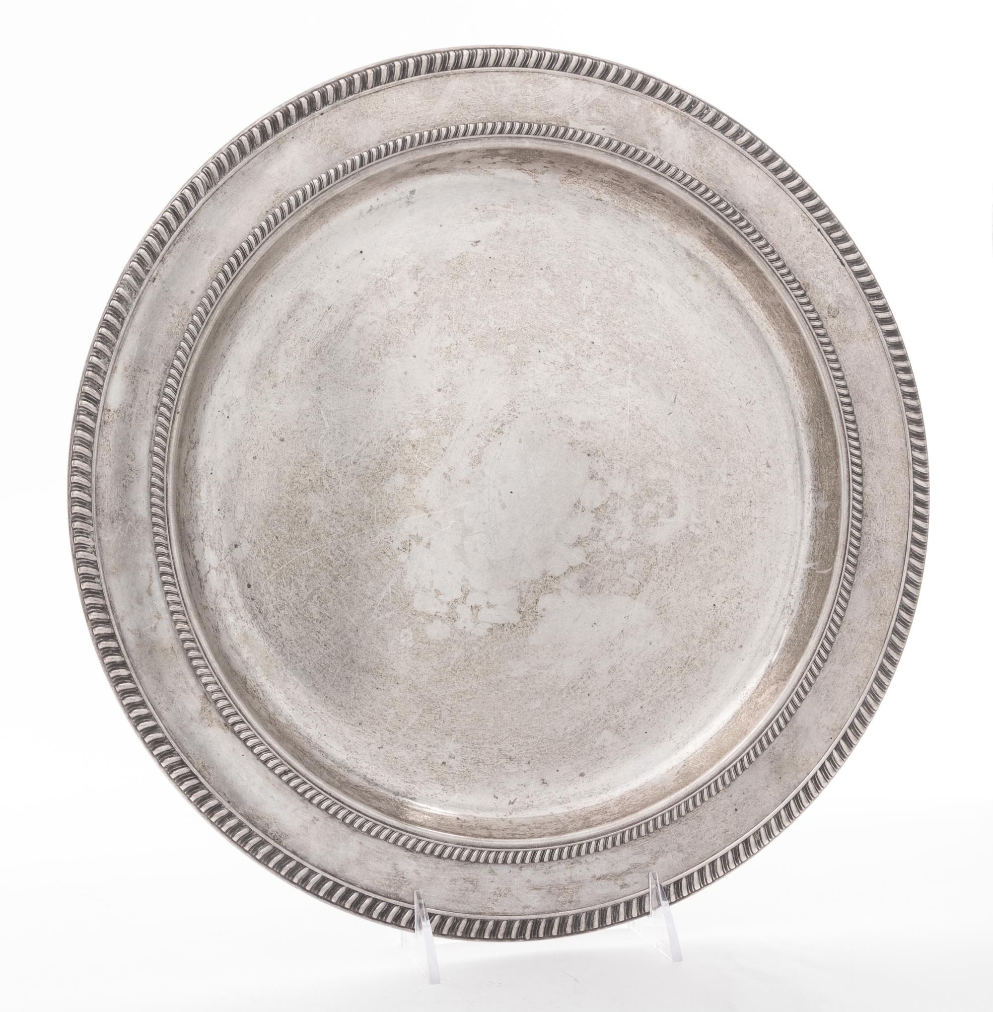 A Silver Charger. Diameter 13 1/2 inches.
