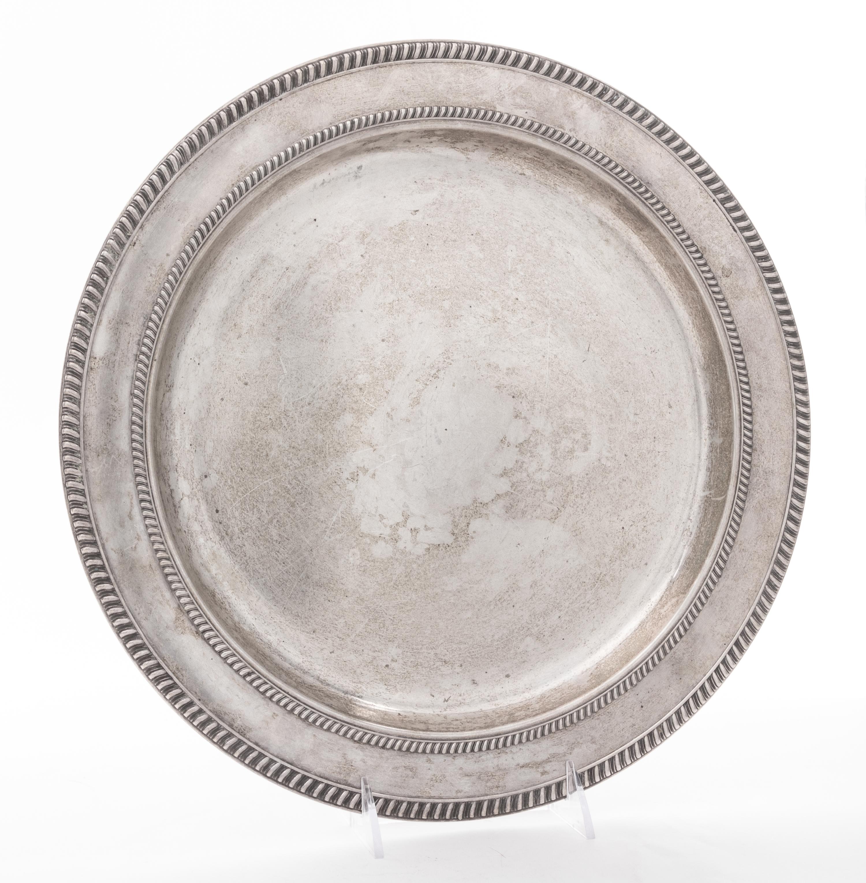A Silver Charger. Diameter 13 1/2 inches.