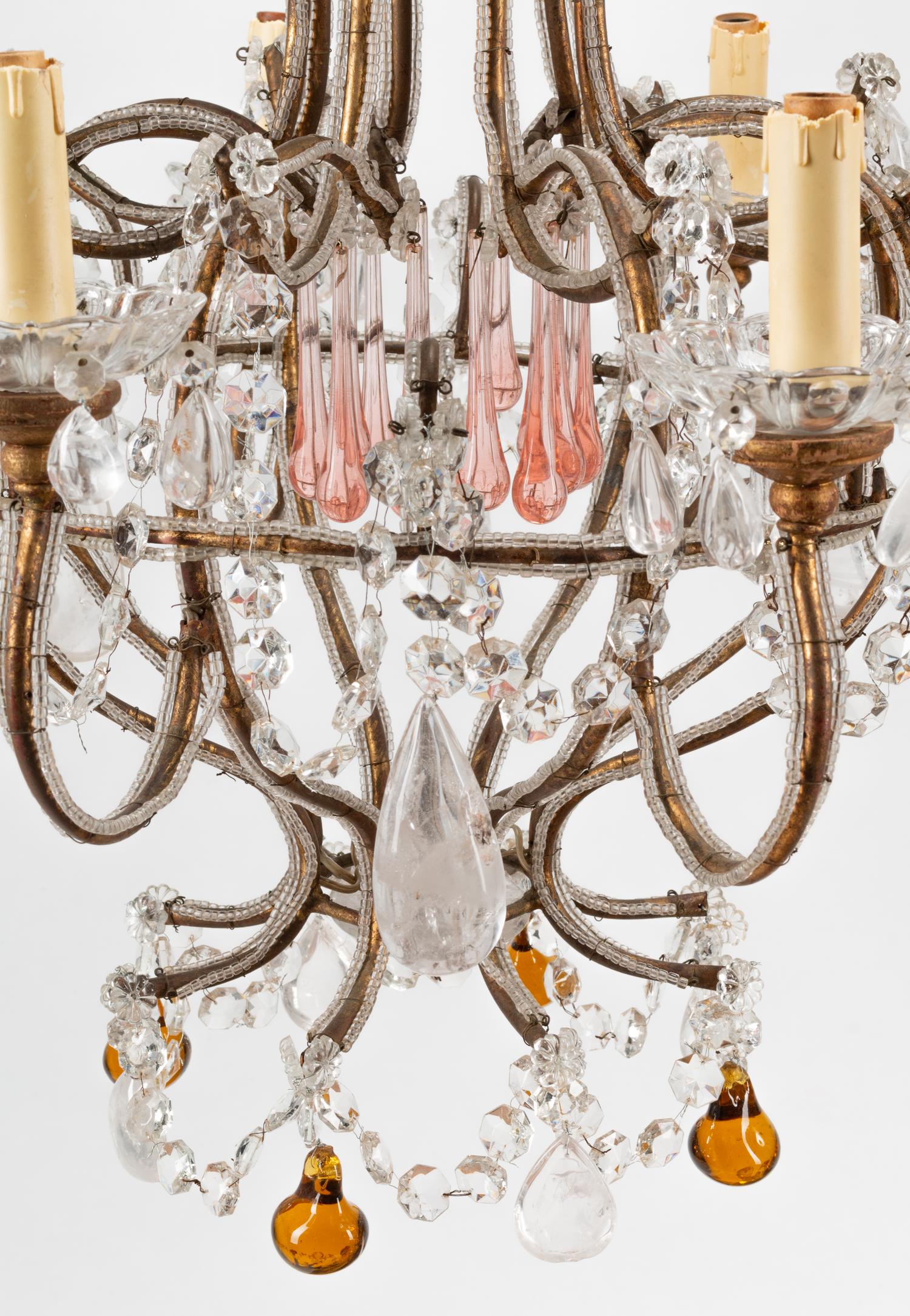 A French Neoclassical Style Eight-Light Chandelier with Glass and Rock Crystal Prisms
