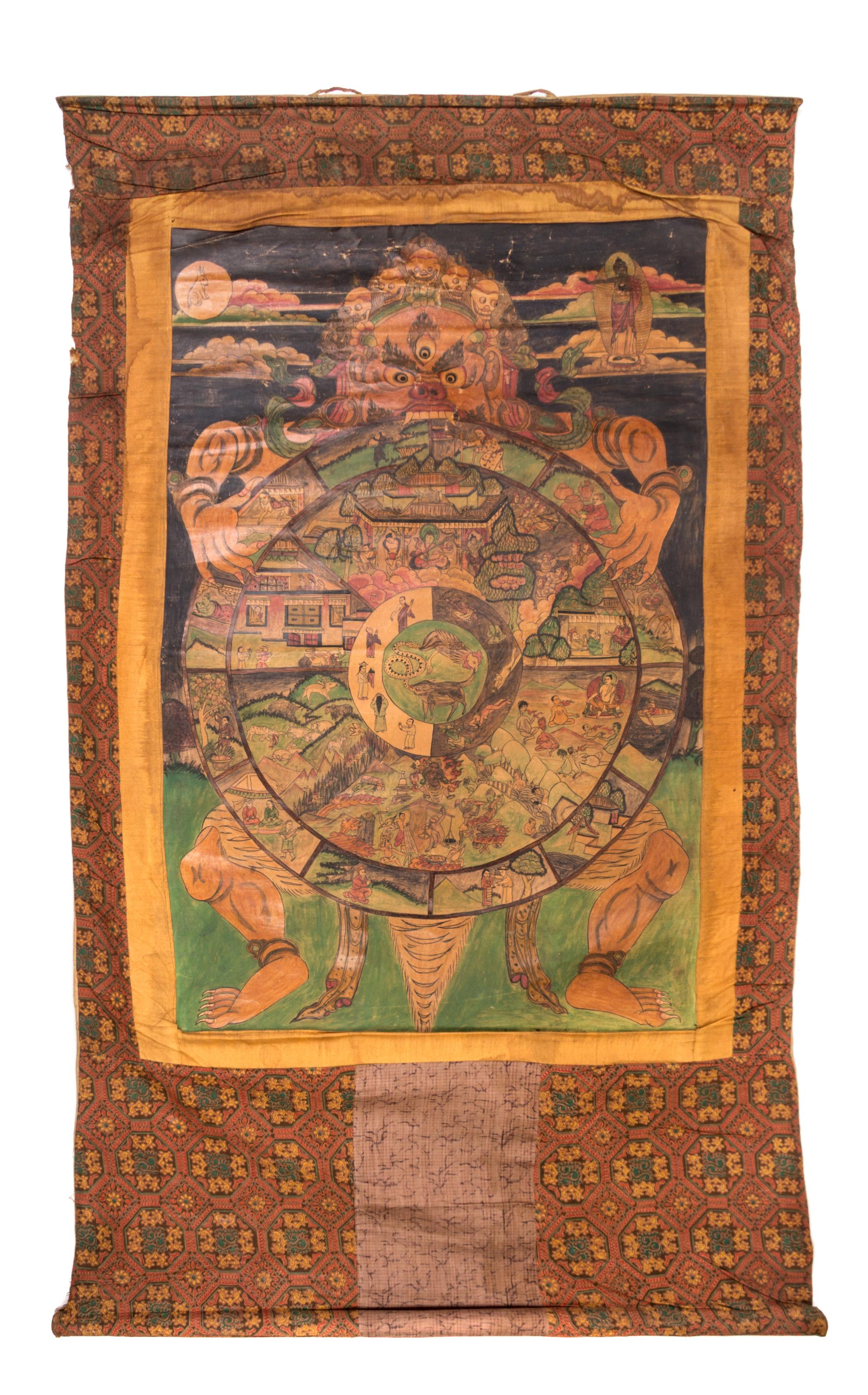 A Tibetan Thangka 31 1/2 x 21 inches (image). — 19TH CENTURY