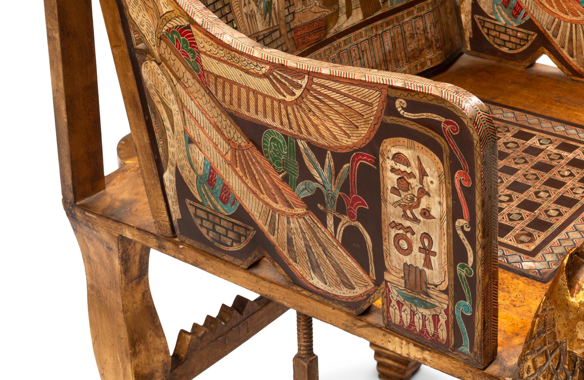 An Egyptian Style Painted Giltwood and Mother-of-Pearl Inlaid Throne Chair