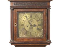 A Queen Anne inlaid and burl walnut veneered and inlaid tall case clock, works by John Sanderson, Wigton, England, early 18th century