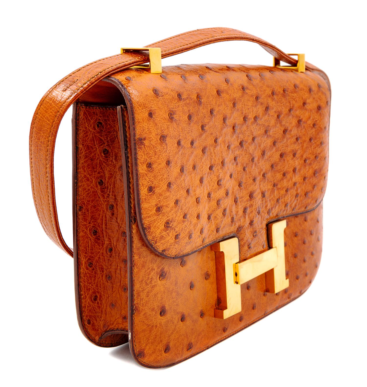 An Hermès Cognac Ostrich Constance Bag, 7" H x 9" W x 2" D; Strap drop: 14" or 8.5".