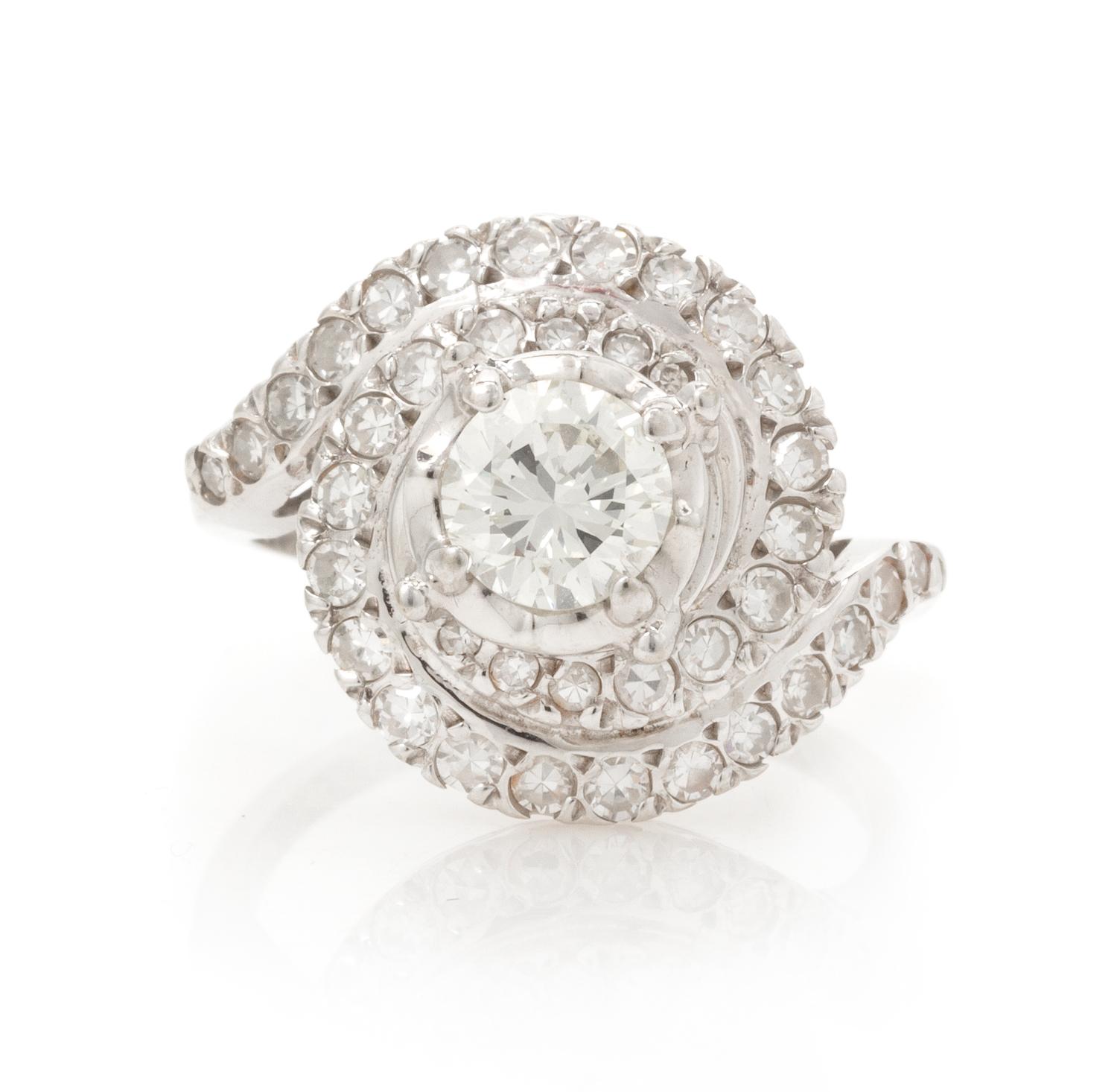 A 14 Karat White Gold and Diamond Ring, 3.50 dwts.