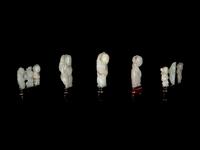 Nine Chinese Carved Celadon Jade Figures of Boys