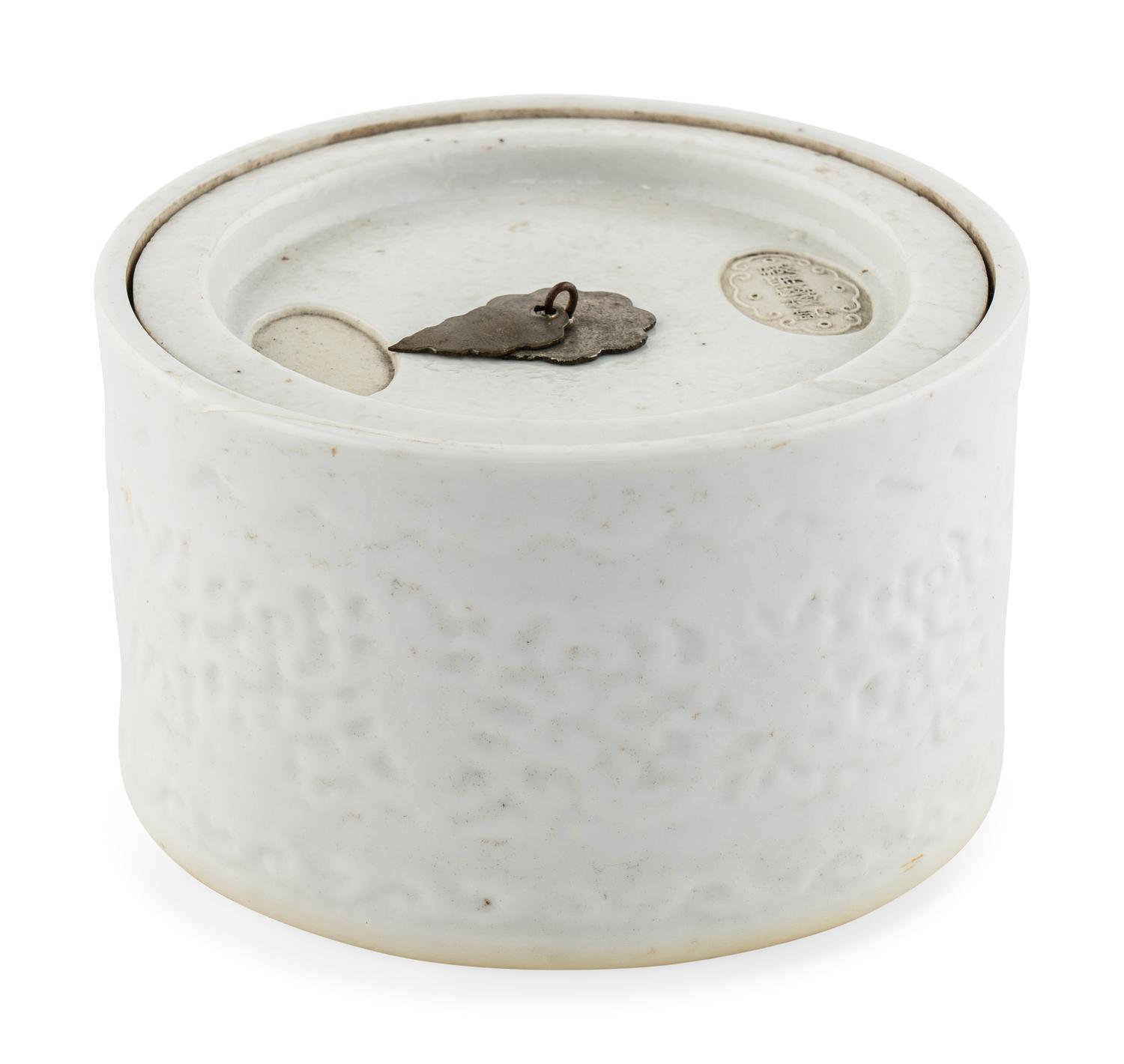 A Chinese Molded White Glazed Porcelain Covered Jar