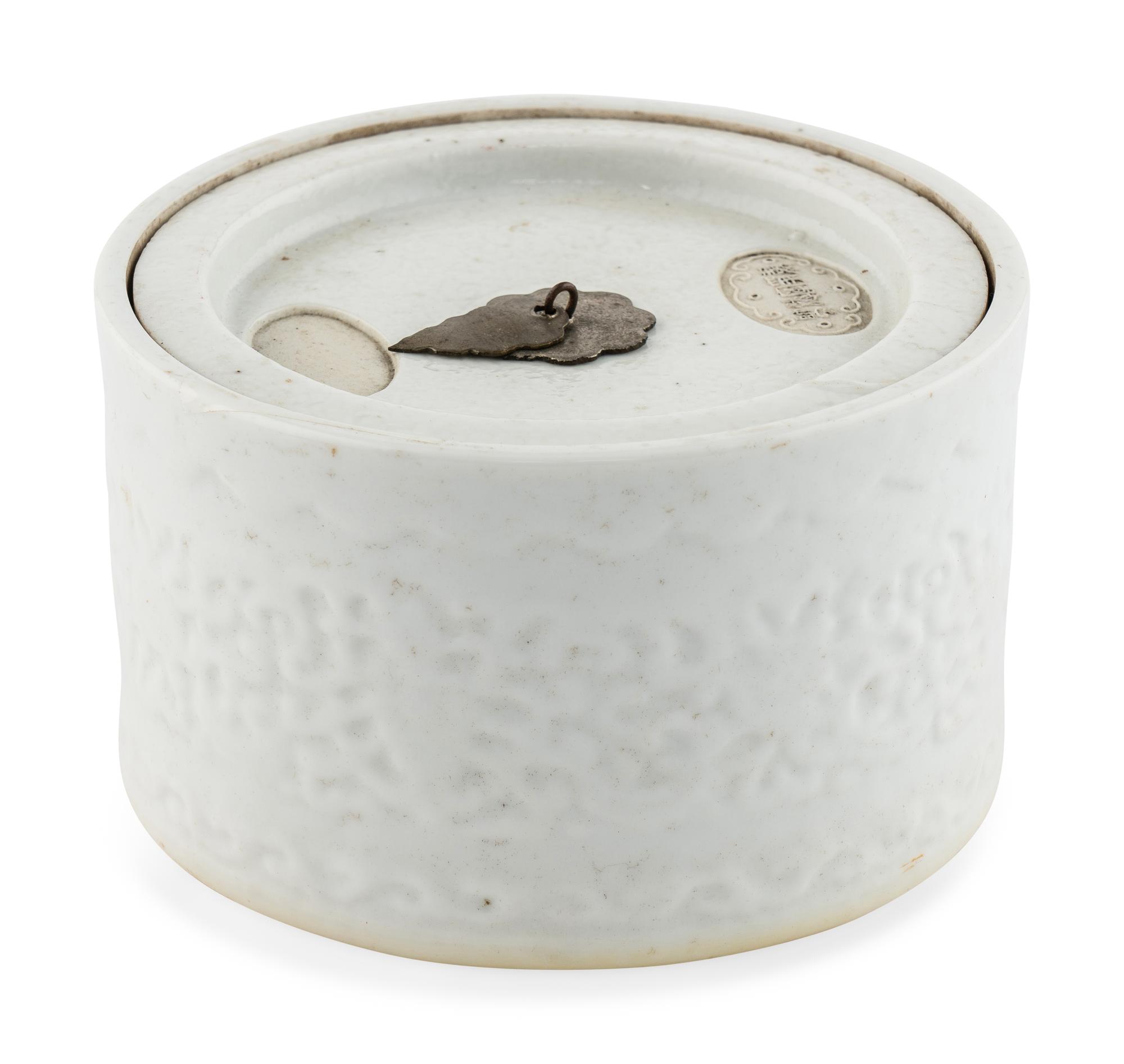 A Chinese Molded White Glazed Porcelain Covered Jar