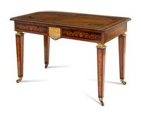 A Victorian Gilt Metal Mounted Amboyna and Marquetry Center Table