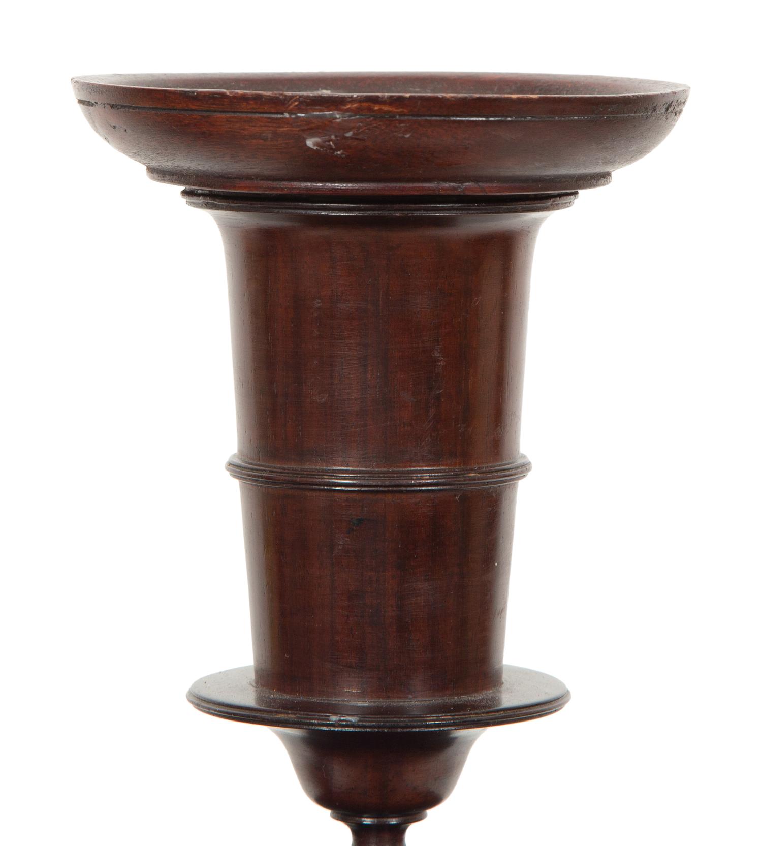 A Pair of Portuguese Colonial Jacaranda Candlesticks