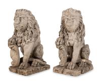 A Pair of Cast Stone Lion Figures