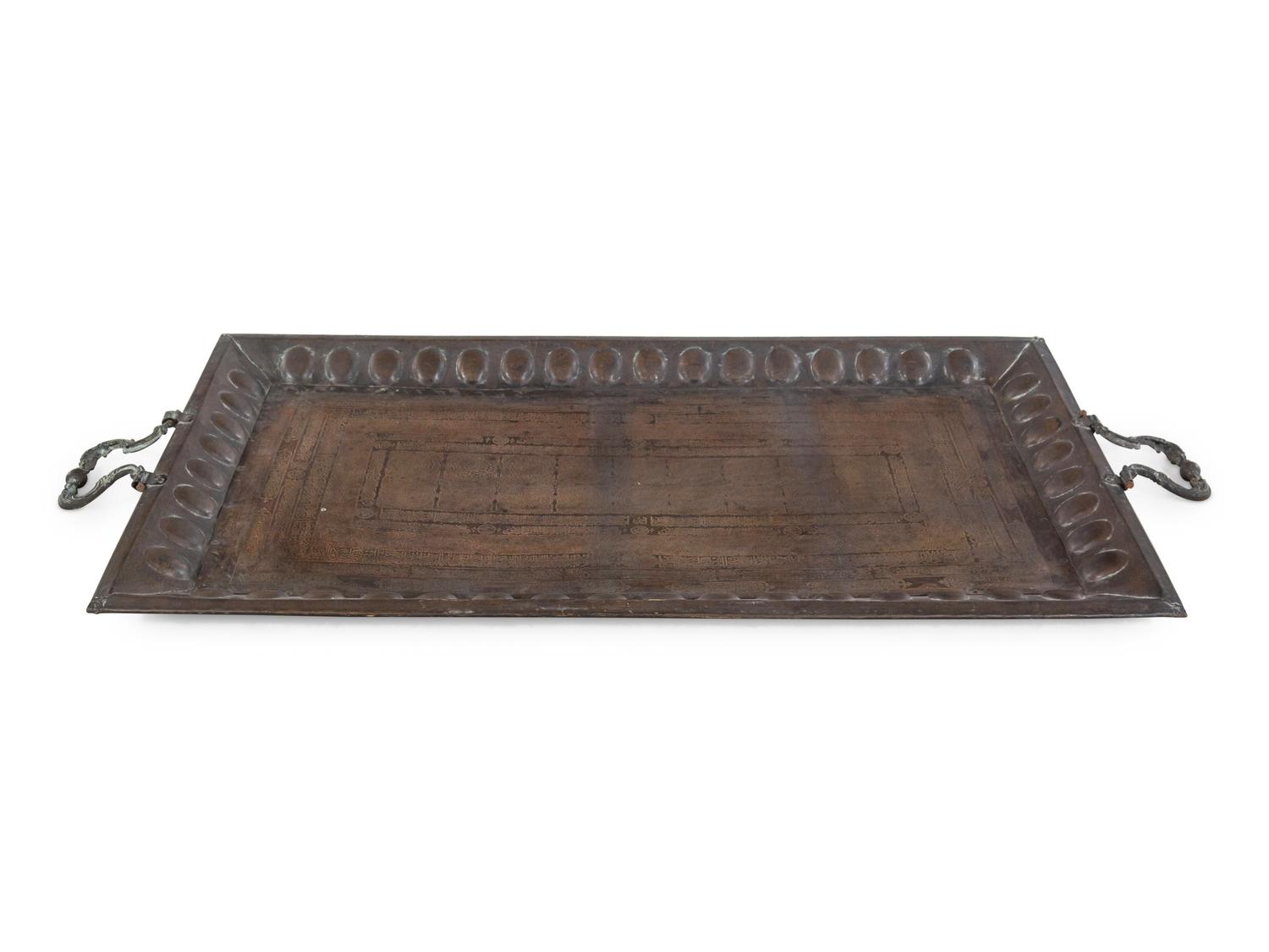 A Large Middle Eastern Damascened Brass Tray