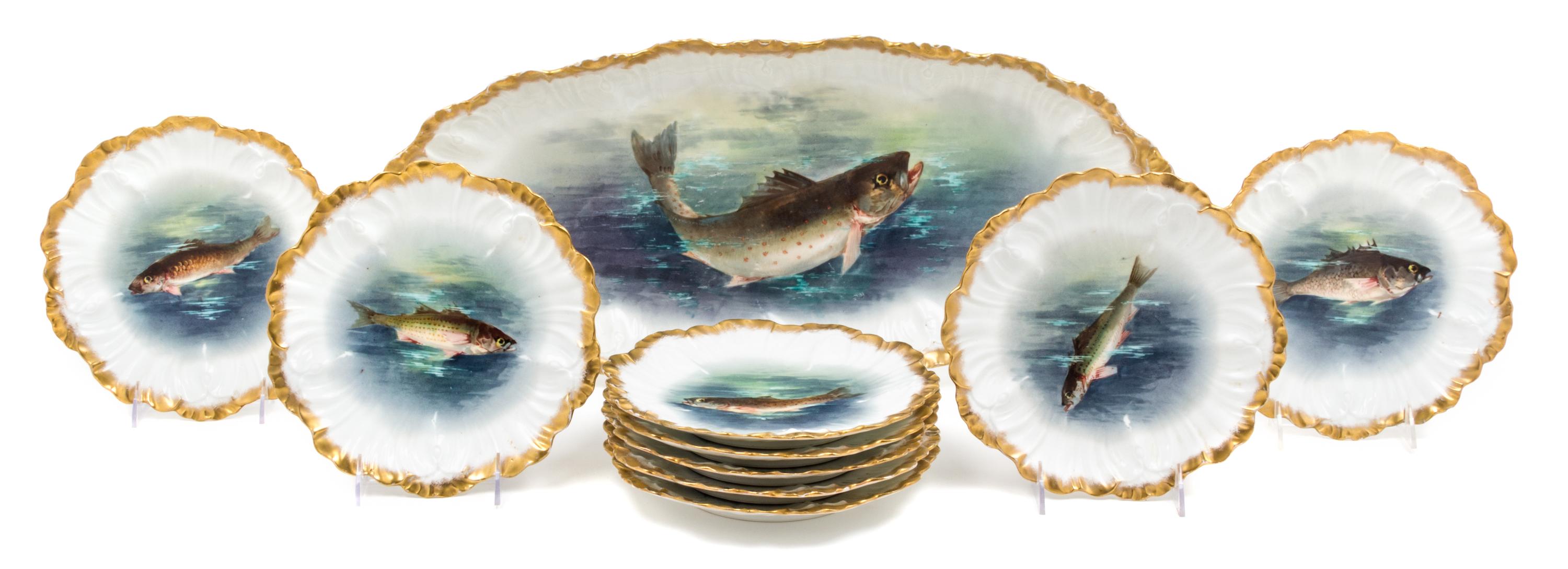 A Limoges Porcelain Fish Service Width of platter 24 3/4 inches. — 20TH CENTURY