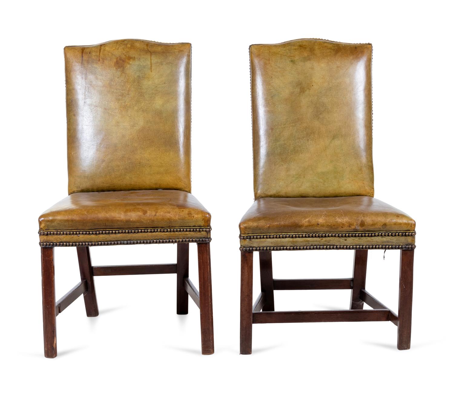 A Pair of George III Leather Upholstered Mahogany Side Chairs