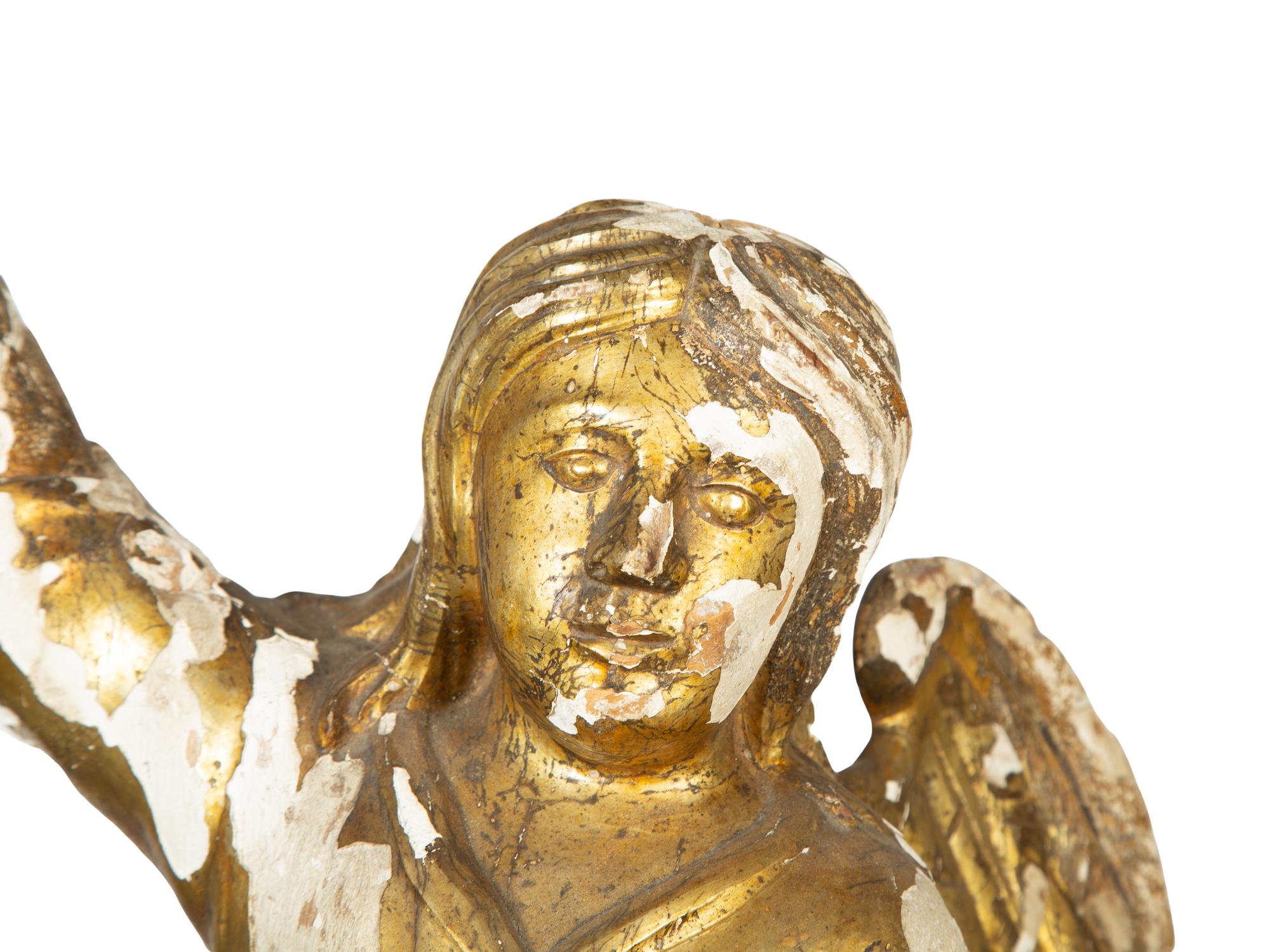 A Continental Giltwood Figure of an Angel