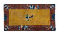 A Chinese Rug 2 feet 2 inches x 3 feet 11 1/2 inches.