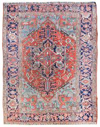 A Heriz Wool Rug 8 feet 7 inches x 6 feet 7 inches.