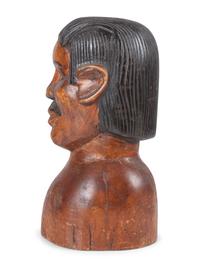 A Carved and Painted Wood Bust of a Mustachioed Man