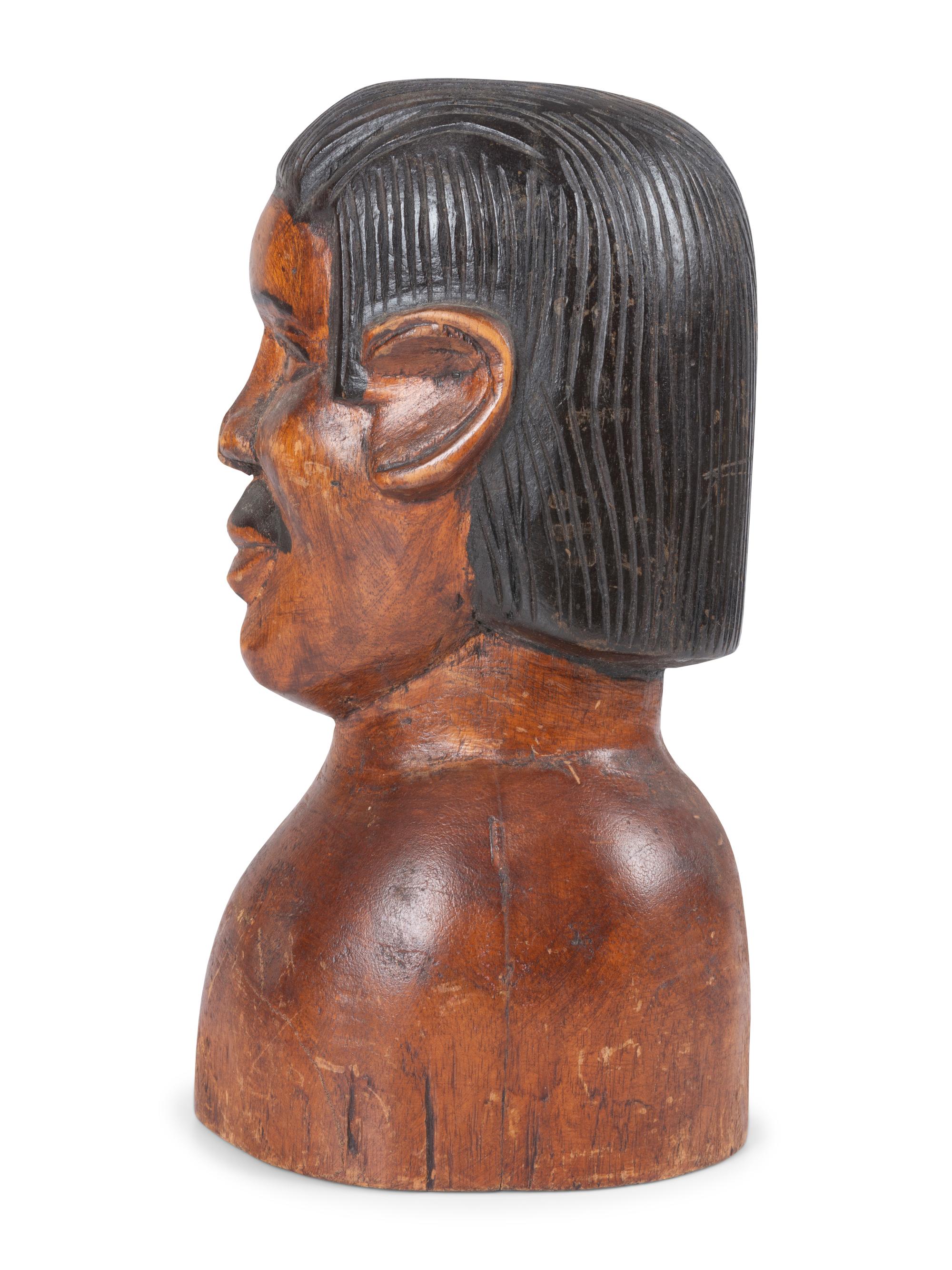 A Carved and Painted Wood Bust of a Mustachioed Man
