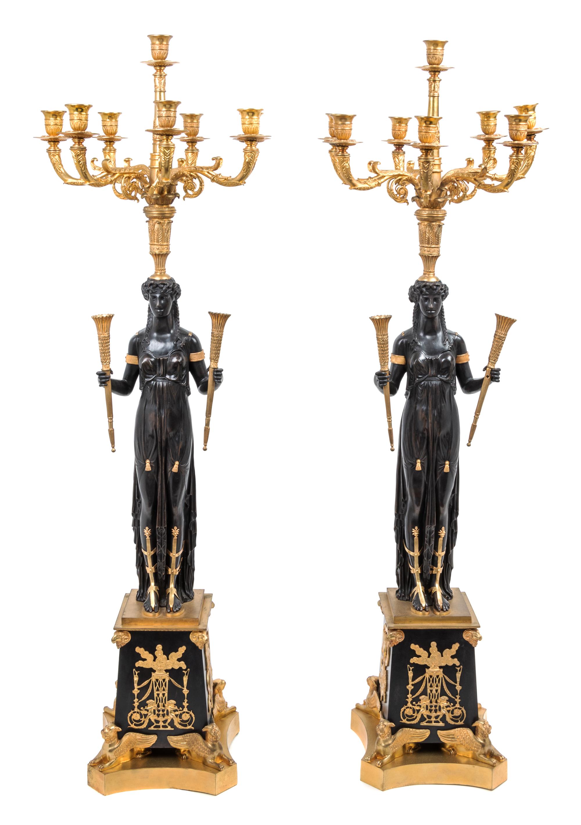 A Pair of Empire Style Gilt and Patinated Bronze Eight-Light Candelabra — MANNER OF PIERRE-PHILIPPE THOMIRE, 19TH CENTURY
