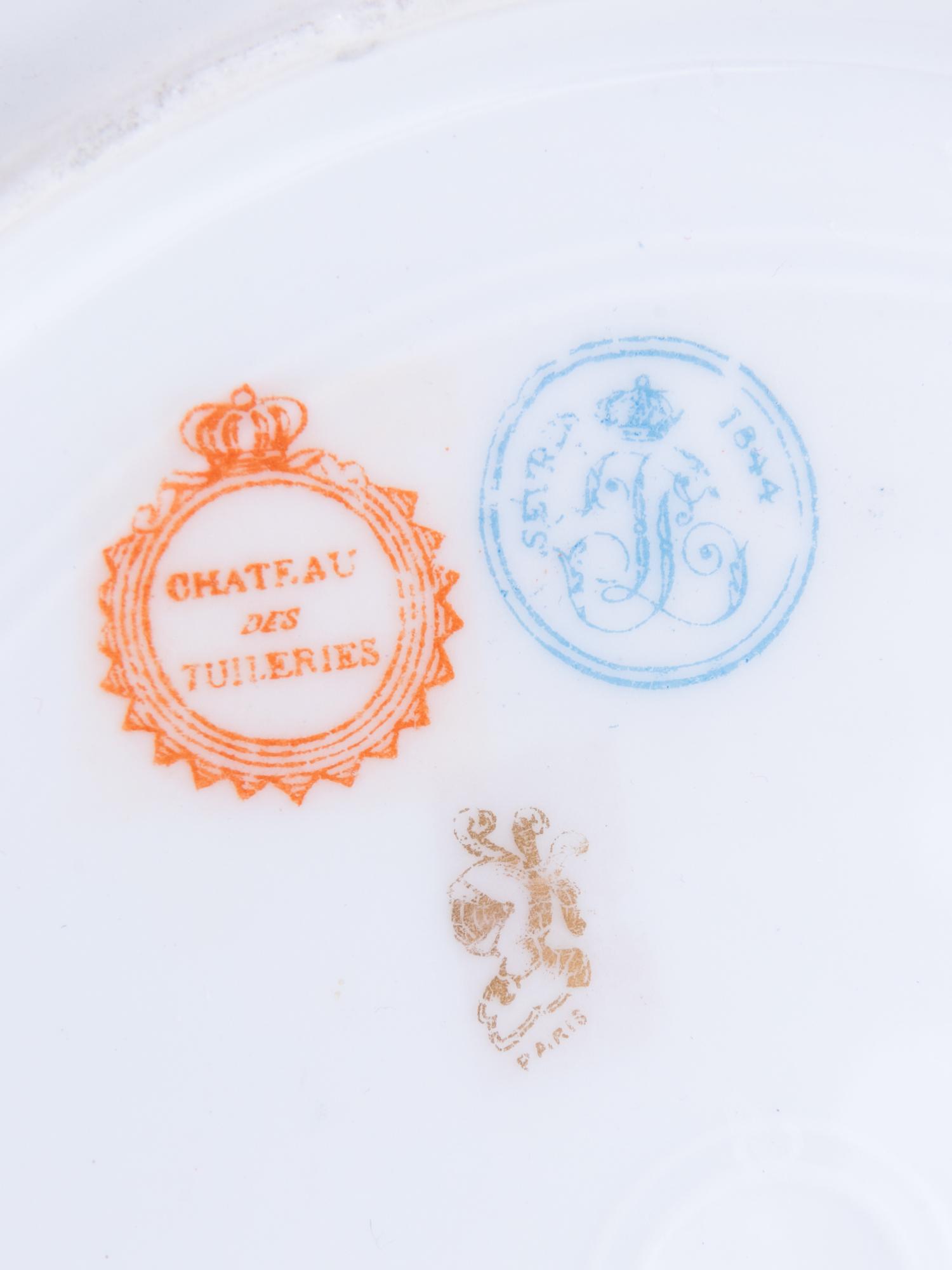 Two Sèvres Style Painted and Parcel Gilt Porcelain Plates