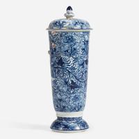 A Chinese blue and white porcelain beaker vase and cover Kangxi period