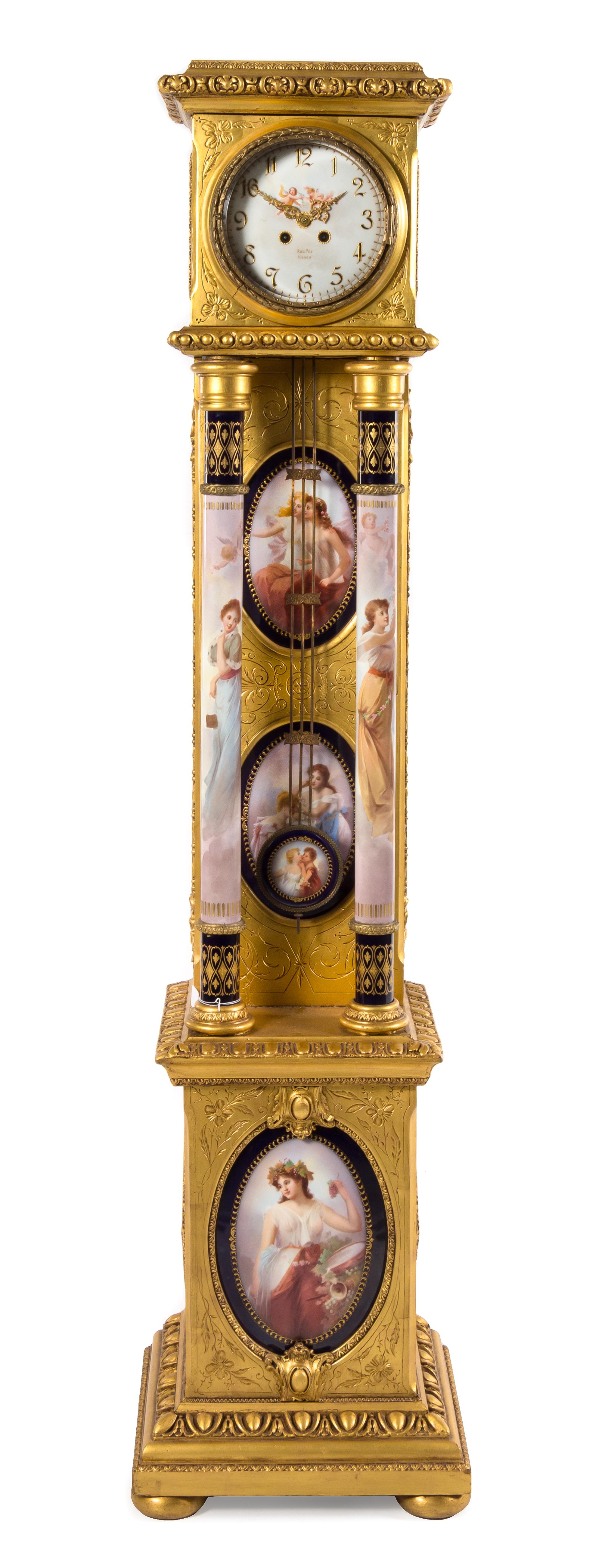 A Vienna Porcelain and Giltwood Tall Case Clock Height 73 1/4 inches. — 19TH CENTURY