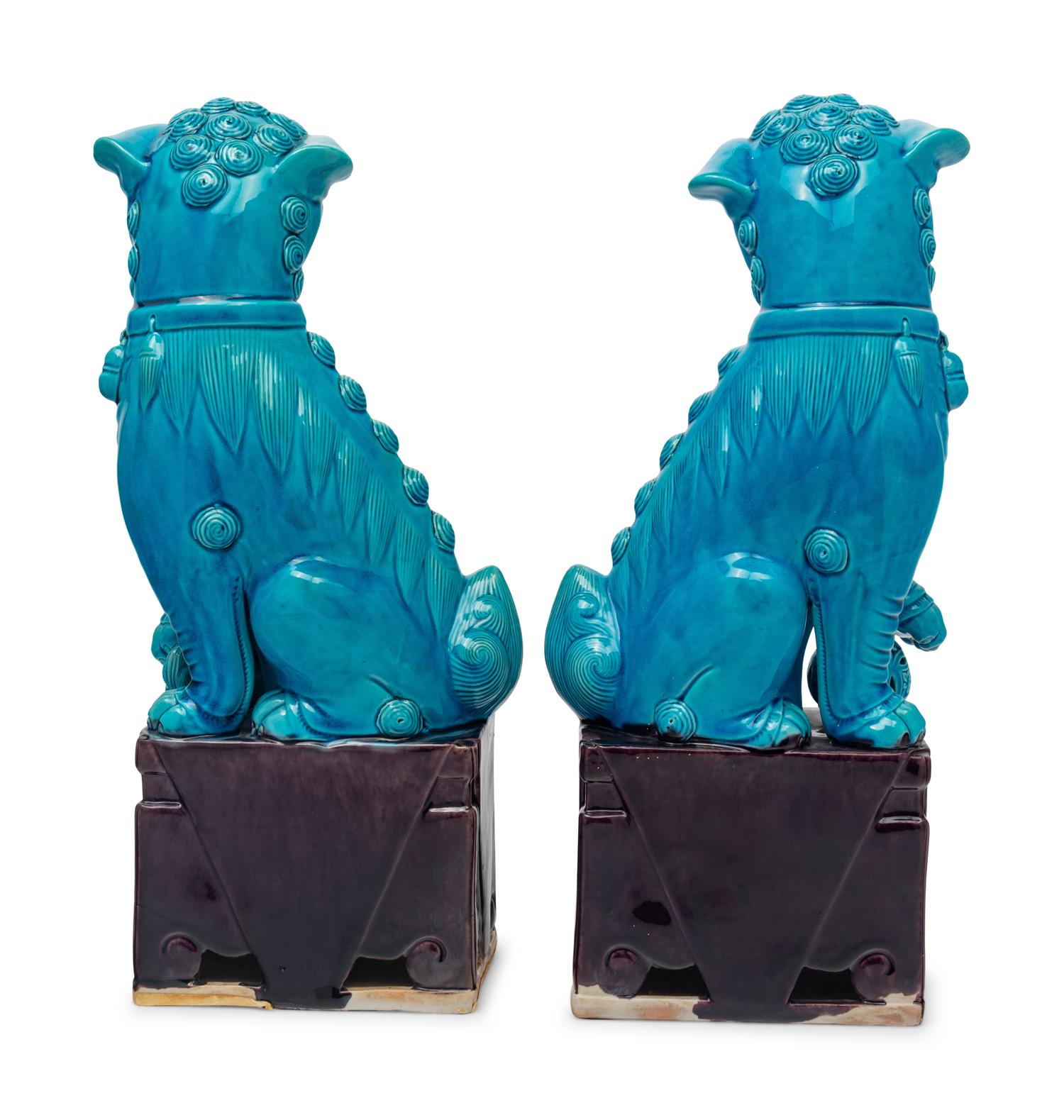 A Pair of Chinese Export Turquoise Glazed Guardian Lions