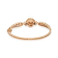 YELLOW GOLD, OPAL AND DIAMOND BANGLE BRACELET