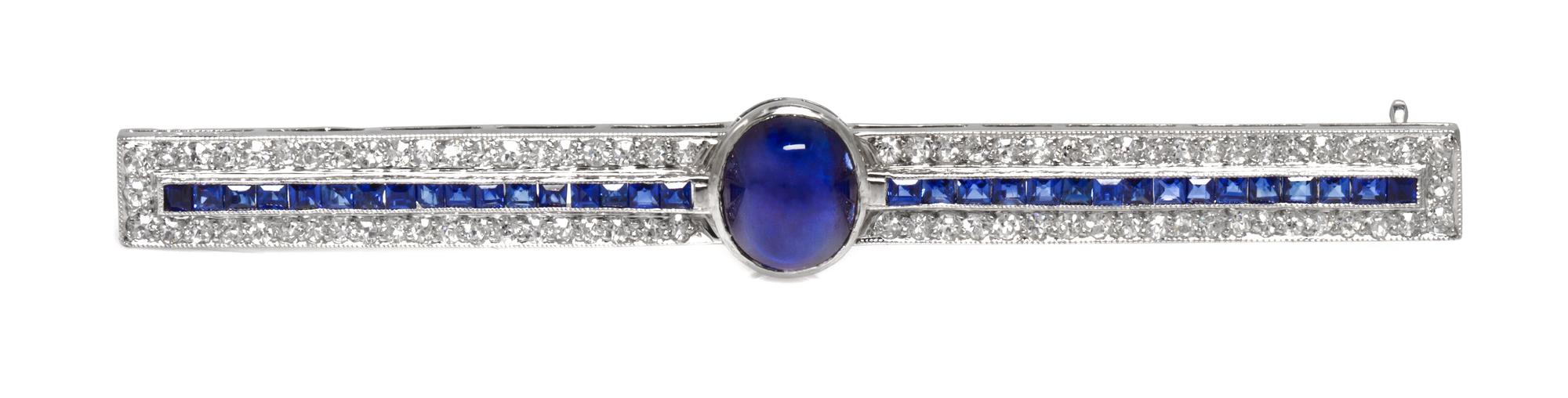 An Art Deco Platinum, Sapphire and Diamond Bar Brooch, 6.90 dwts.