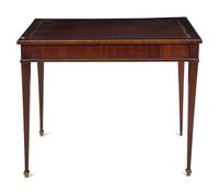 A Russian or Baltic Neoclassical Brass Mounted Mahogany Four-Drawer Table