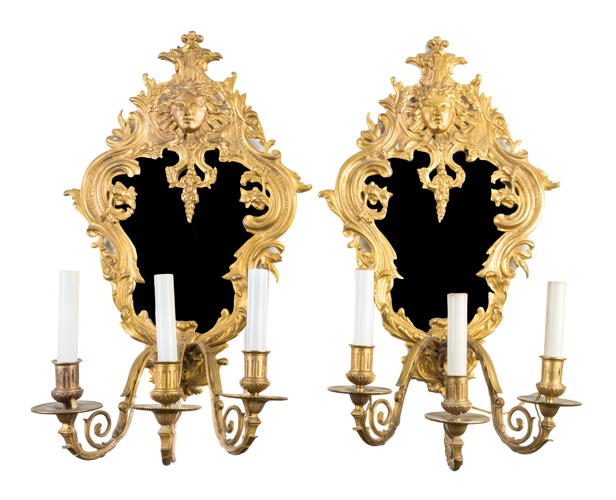 A Pair of Neoclassical Gilt Bronze Two-Light Sconces Height 23 inches.
