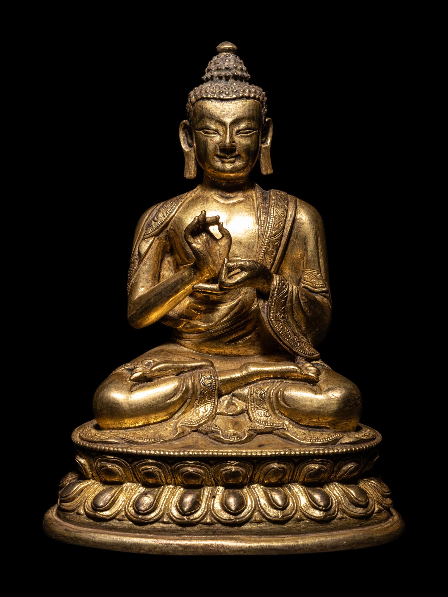 A Sino-Tibetan Gilt Bronze Seated Figure of Buddha Shakyamuni